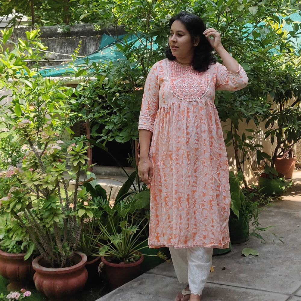 Orange floral printed Embroidered yoke kurta