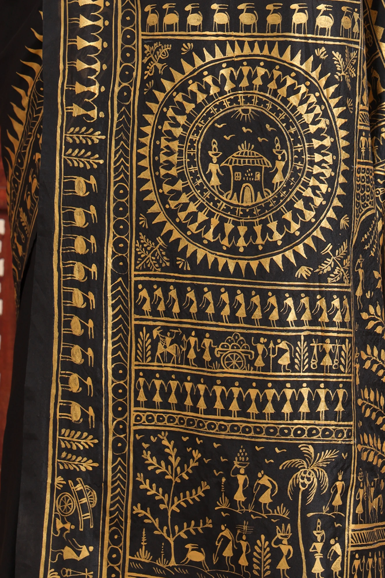 Handpainted Tribal Art Saree – Black with Golden Artwork