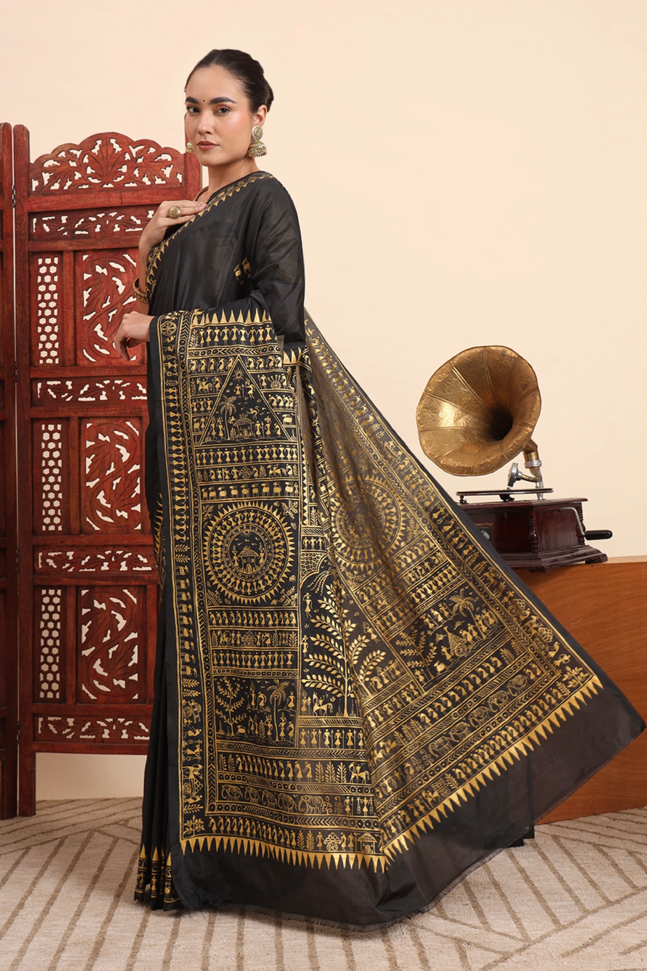 Handpainted Tribal Art Saree – Black with Golden Artwork