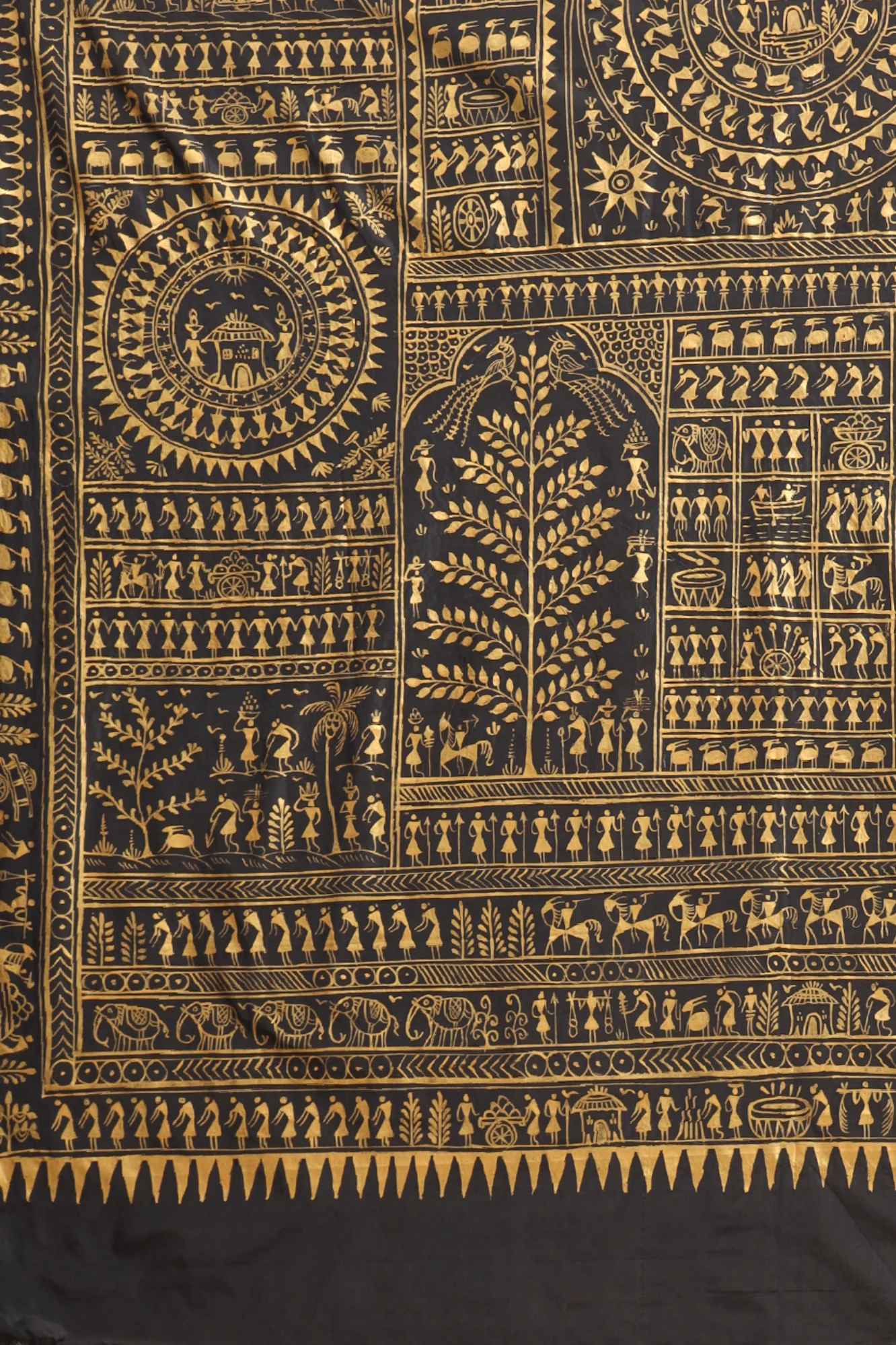Handpainted Tribal Art Saree – Black with Golden Artwork