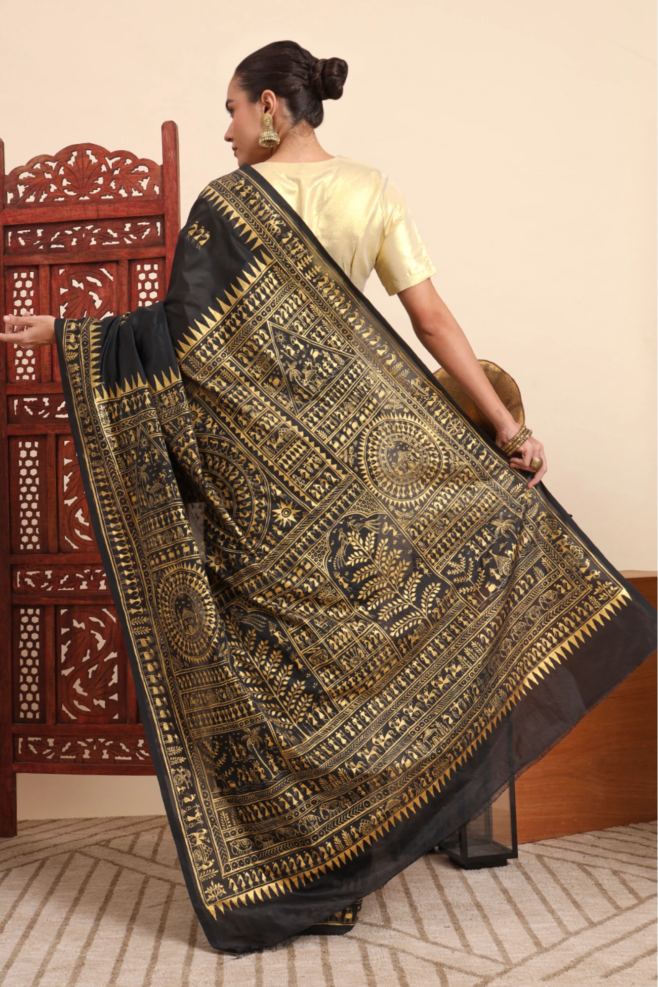 Handpainted Tribal Art Saree – Black with Golden Artwork