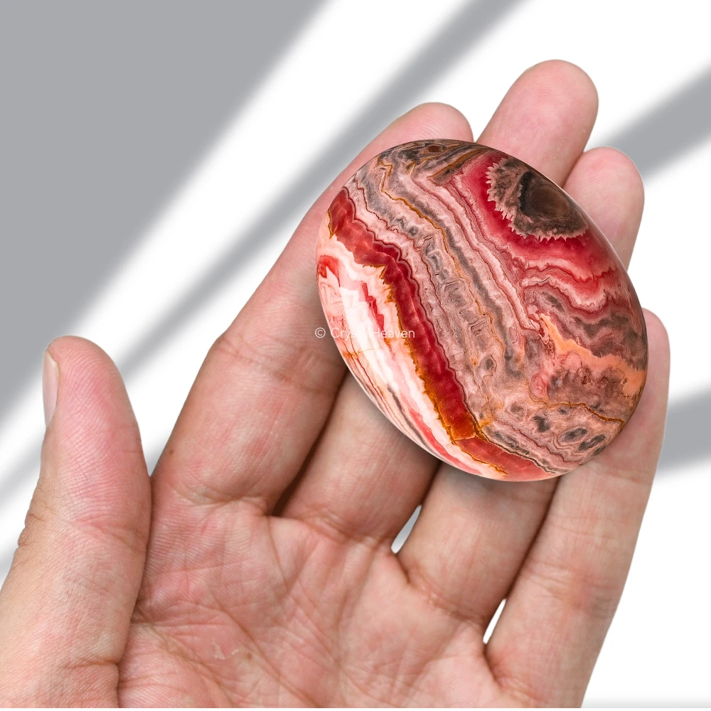 Rhodochrosite Palm Stone