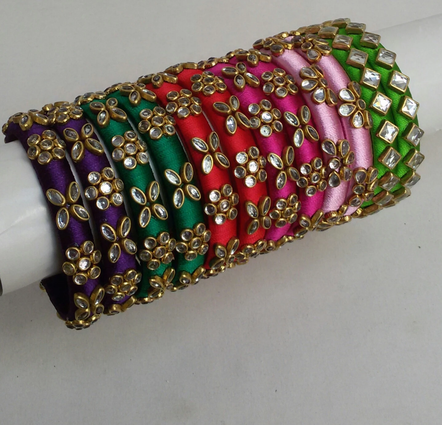 Hand crafted silkthread bangles with kundans
