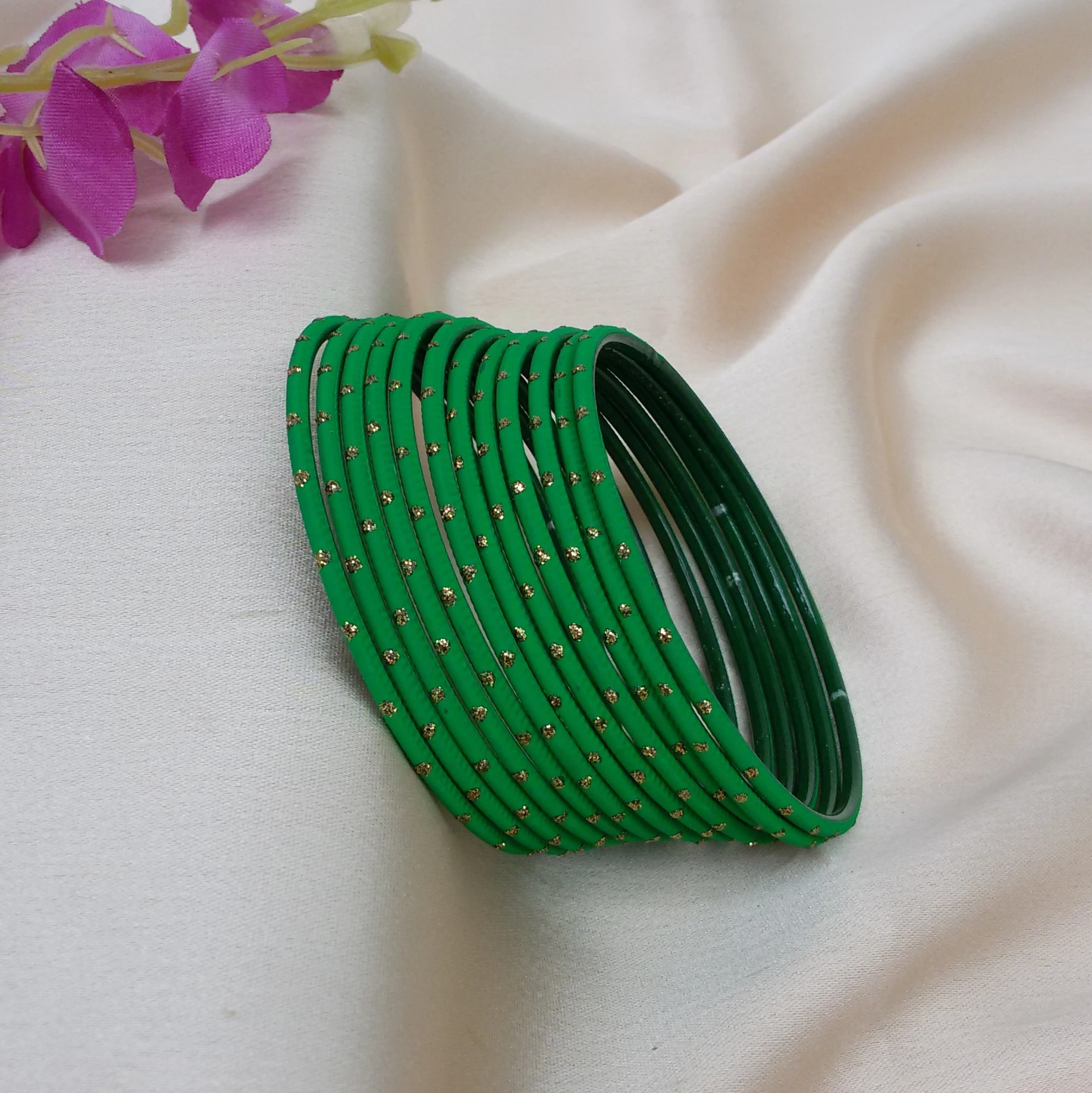 Set of 12 green dotted bangles (2.2)