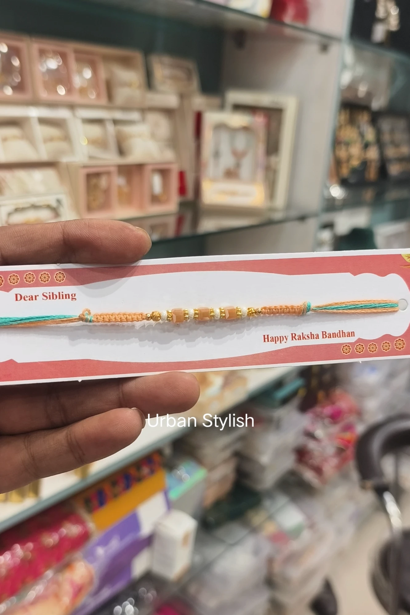 WHITE PEARLS THREAD RAKHI (A36)
