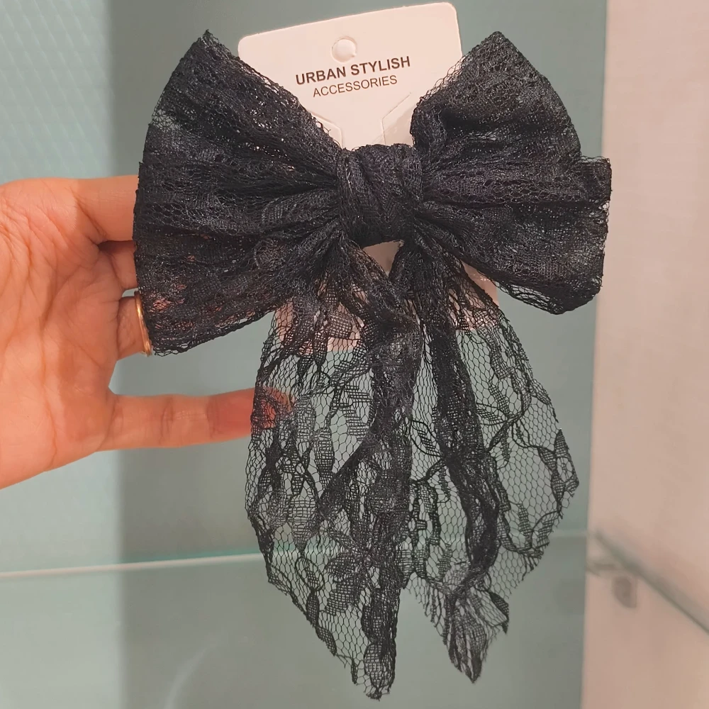 NAURA BLACK BOW