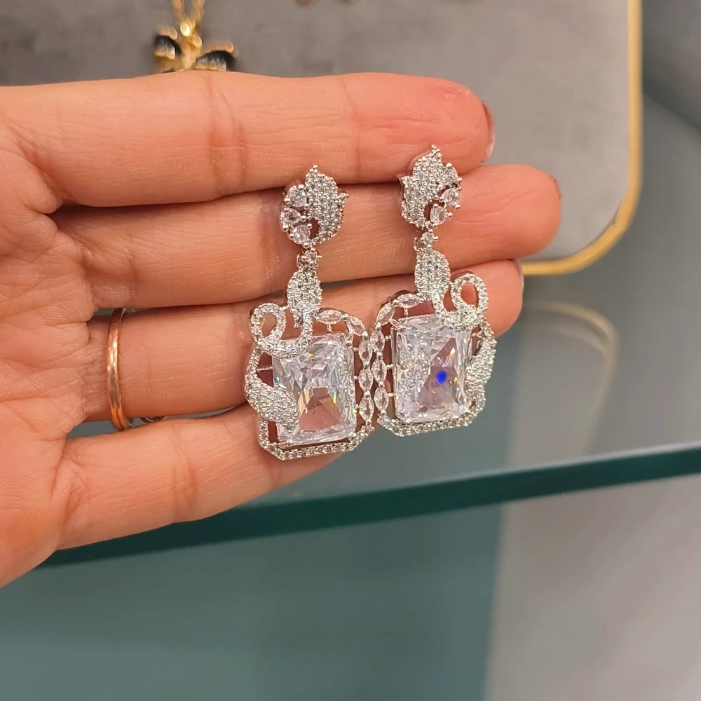 REHMAT SILVER AD EARRINGS