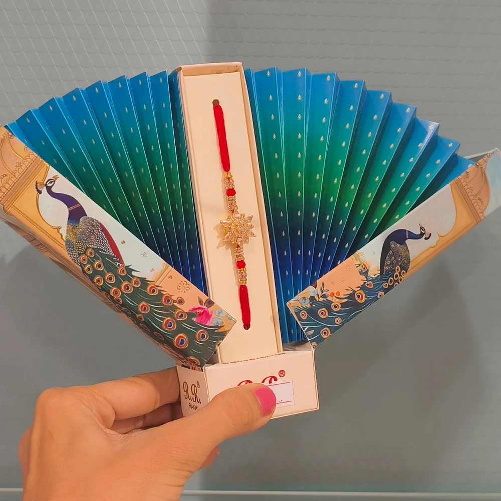 RAHA AD PEACOCK RAKHI