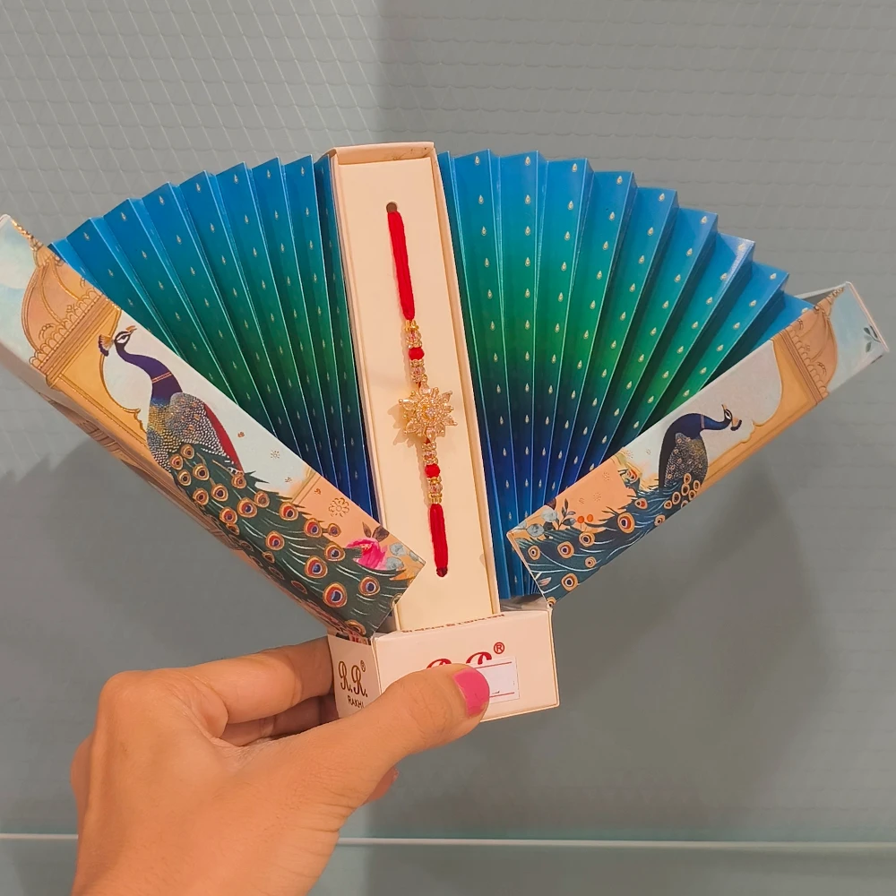 RAHA AD PEACOCK RAKHI