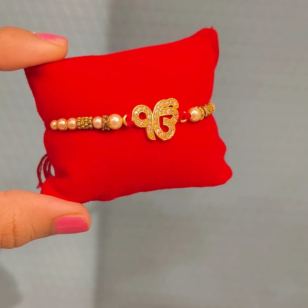 EK ONKAR CUSHION RAKHI