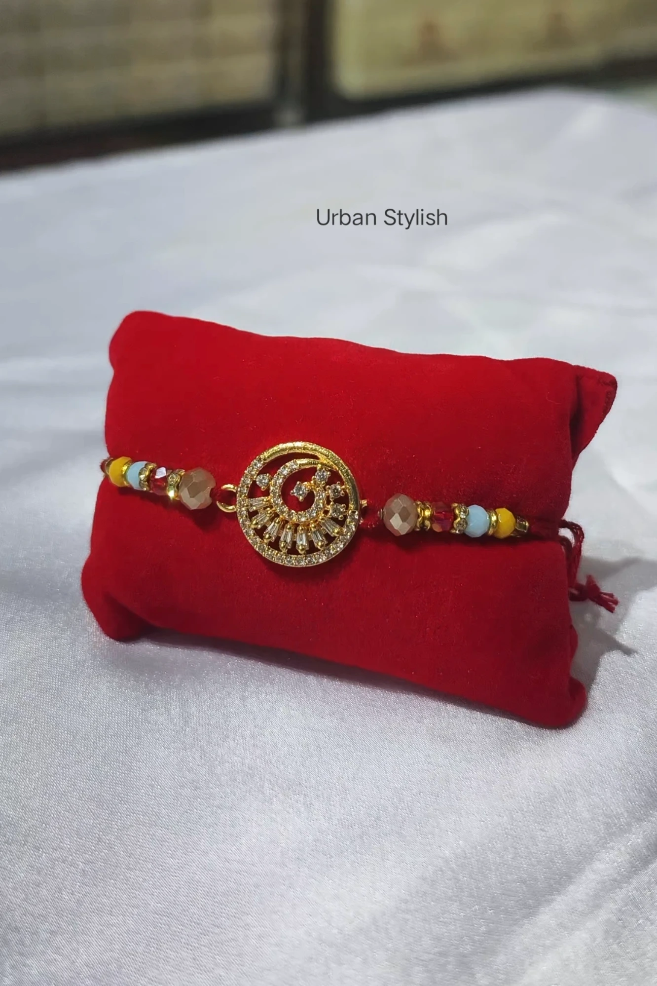 PEECOCK MOTI RAKHI (A21)