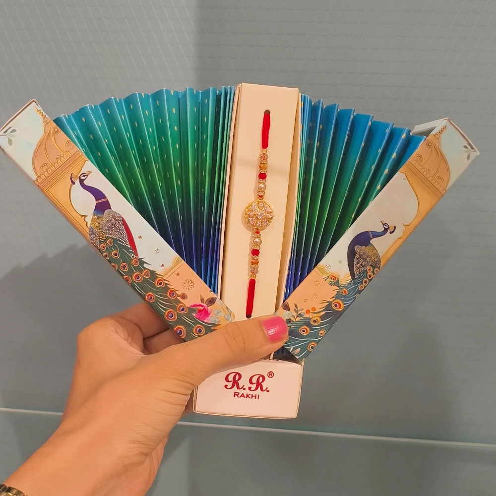 ALAM AD PEACOCK RAKHI