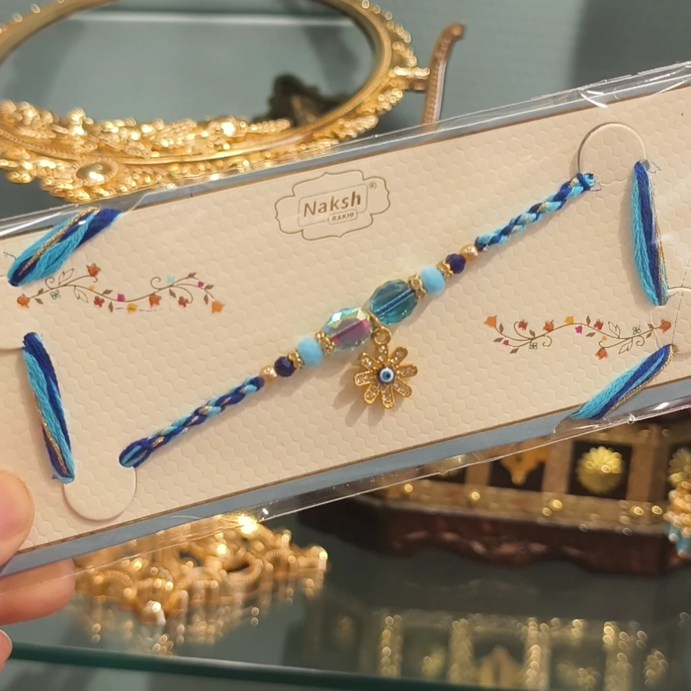 Ria blue evil eye lumba rakhi