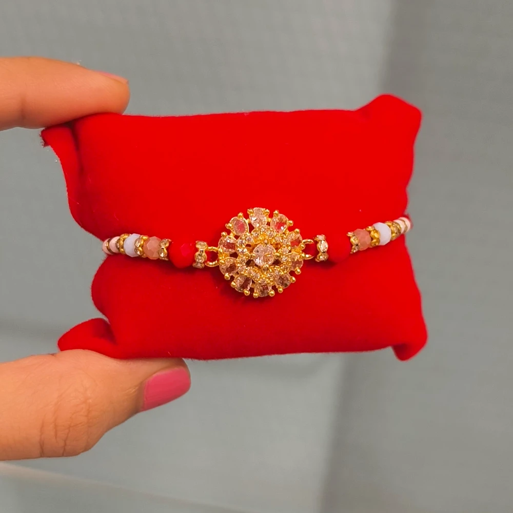 ROUND AD CUSHION RAKHI