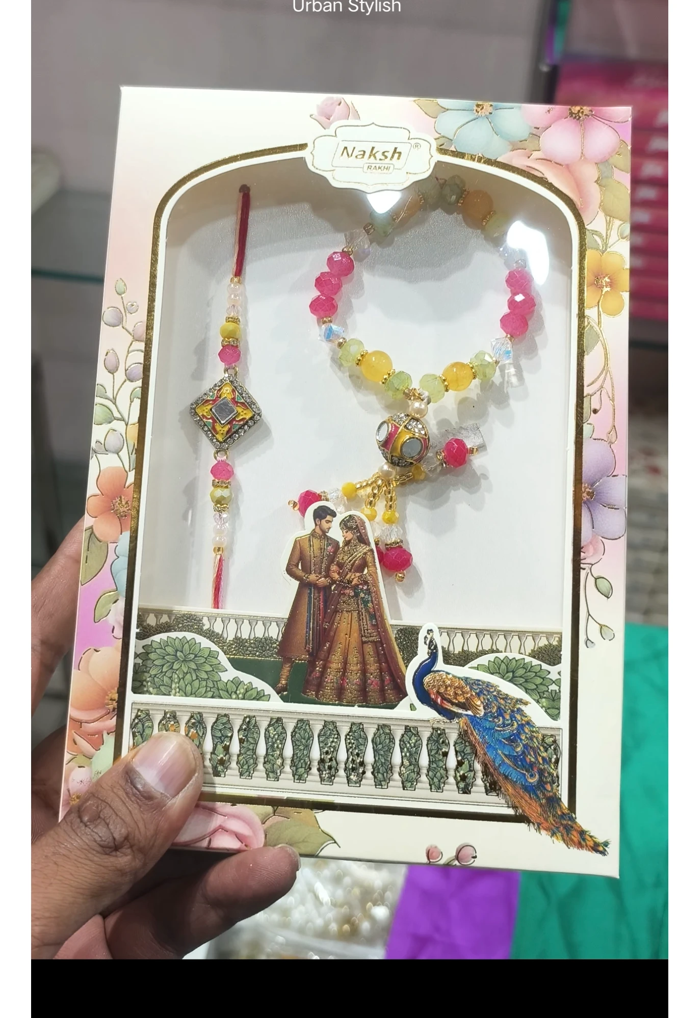 LOVELY PAIR MULTI COLOUR RAKHI COMBO (4216)