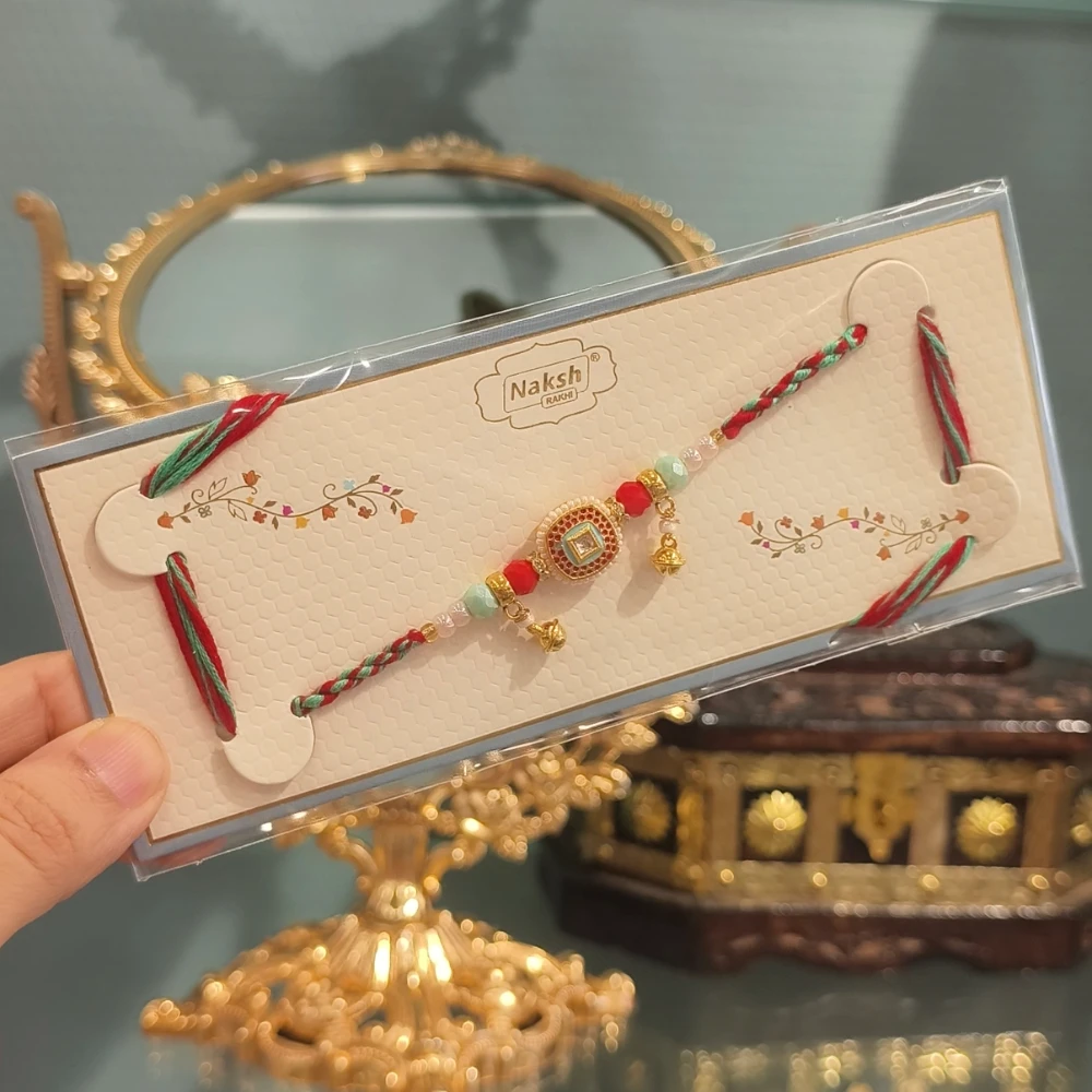 AMEERA BLUE AND RED LUMBA  RAKHI