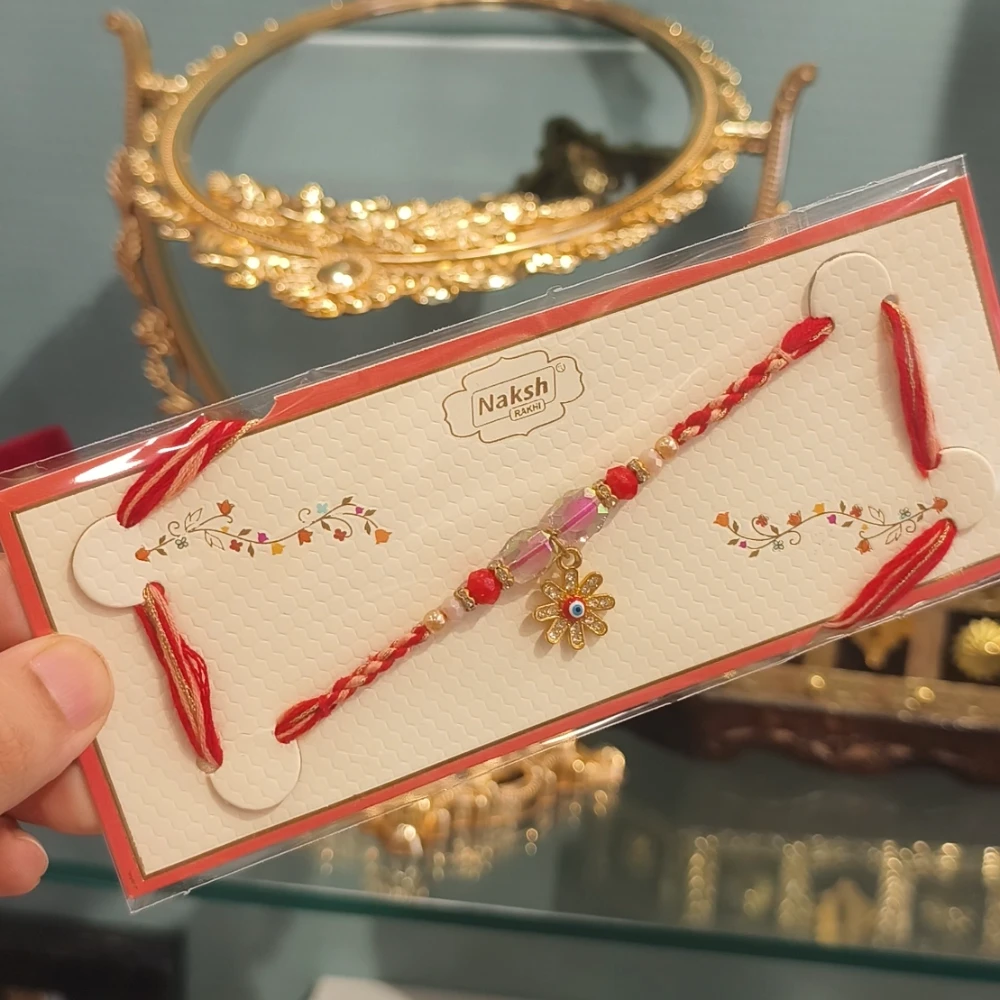 RIA RED PINK EVIL EYE LUMBA RAKHI