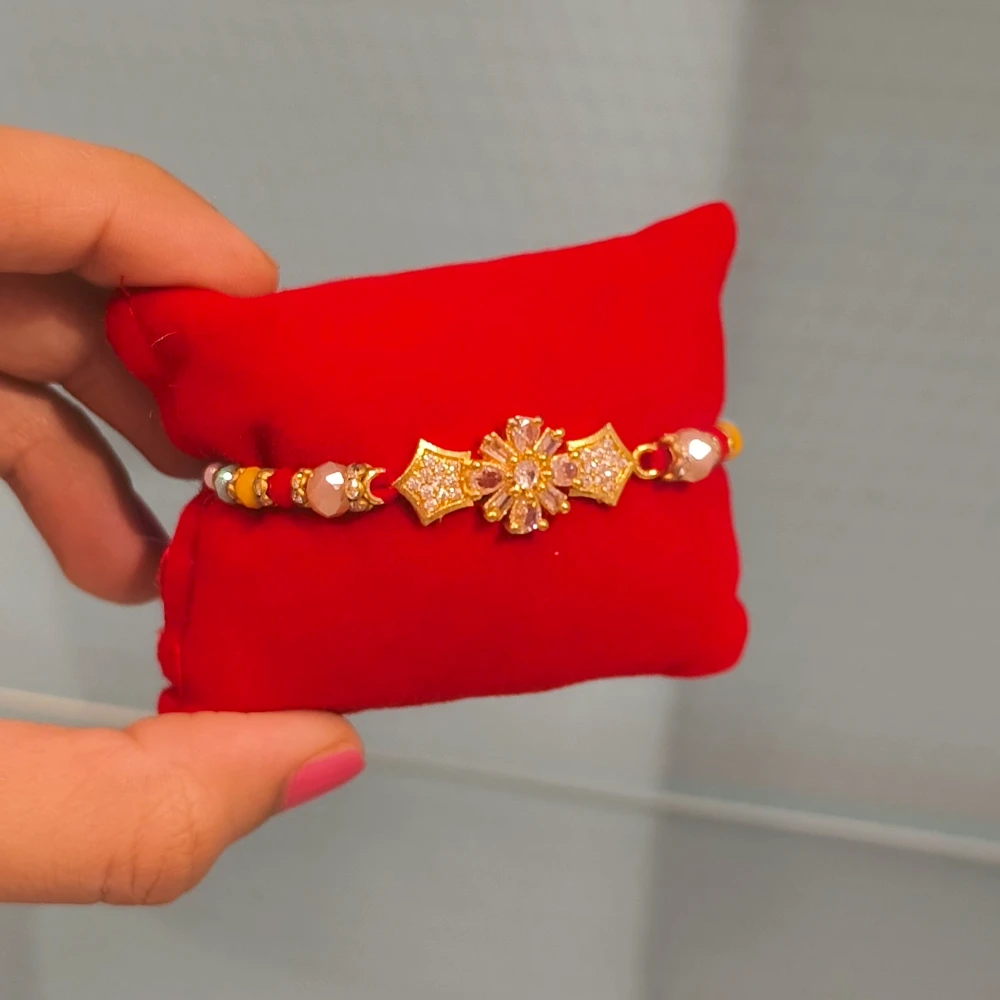 FLOWER CUSHION RAKHI
