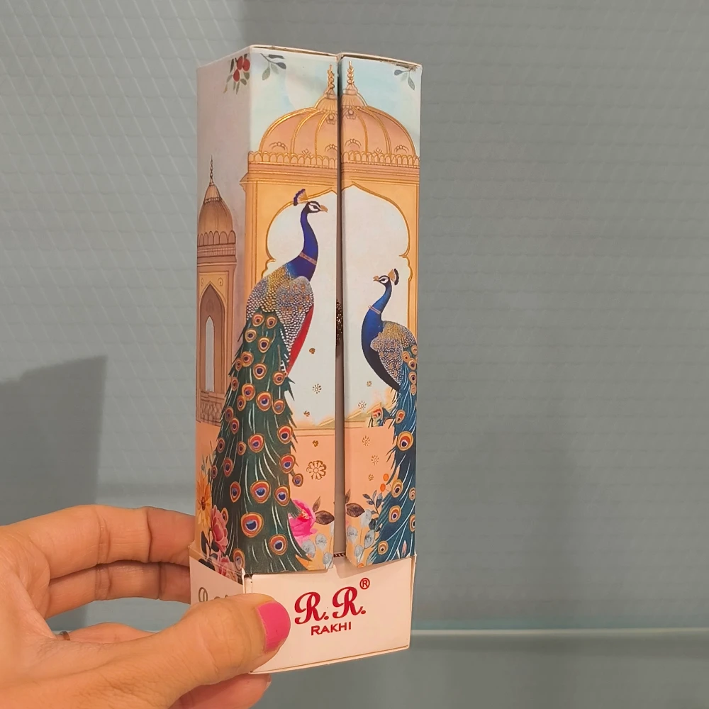 RAHA AD PEACOCK RAKHI