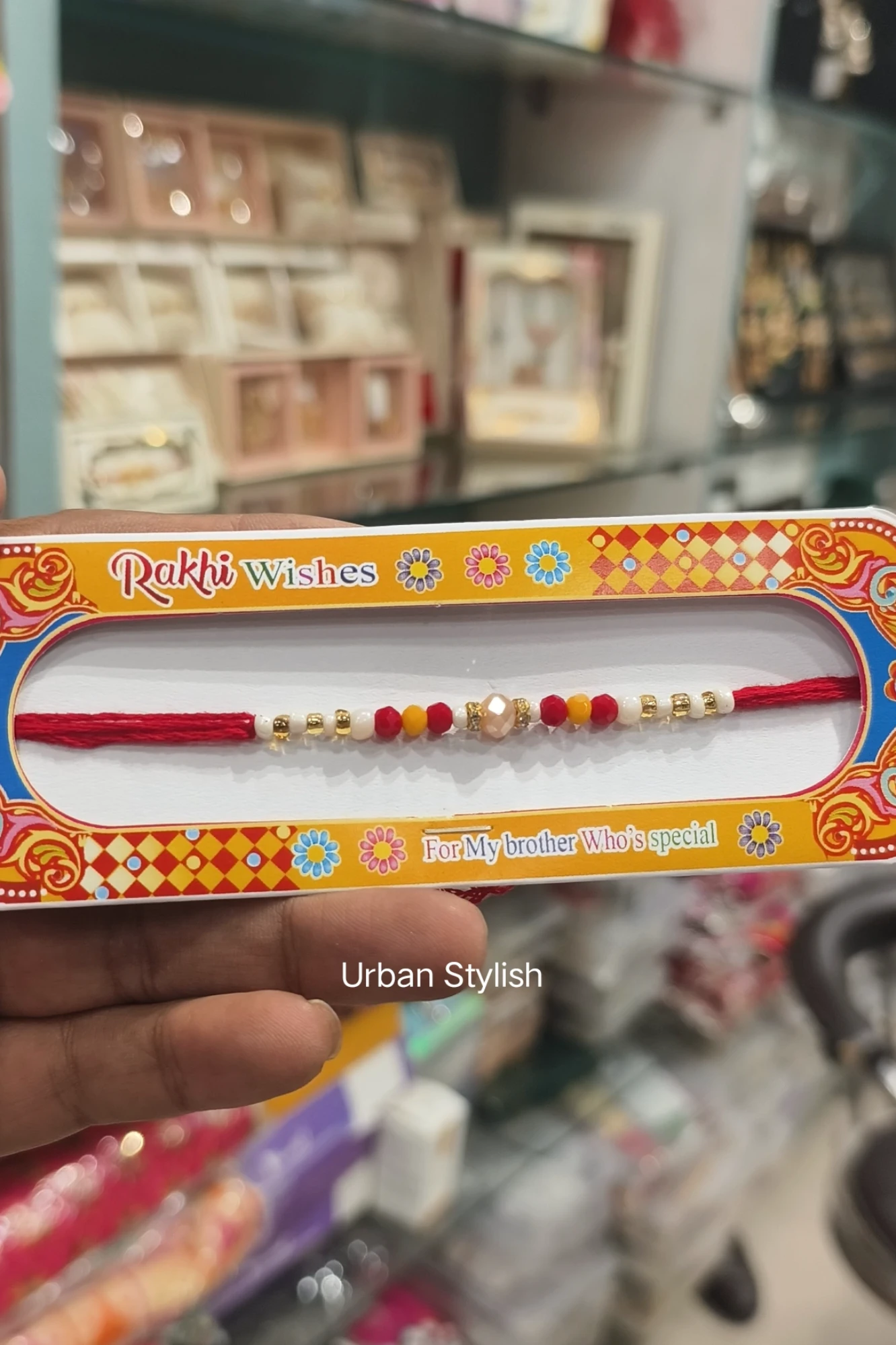 RED PEARL THREAD RAKHI (A37)