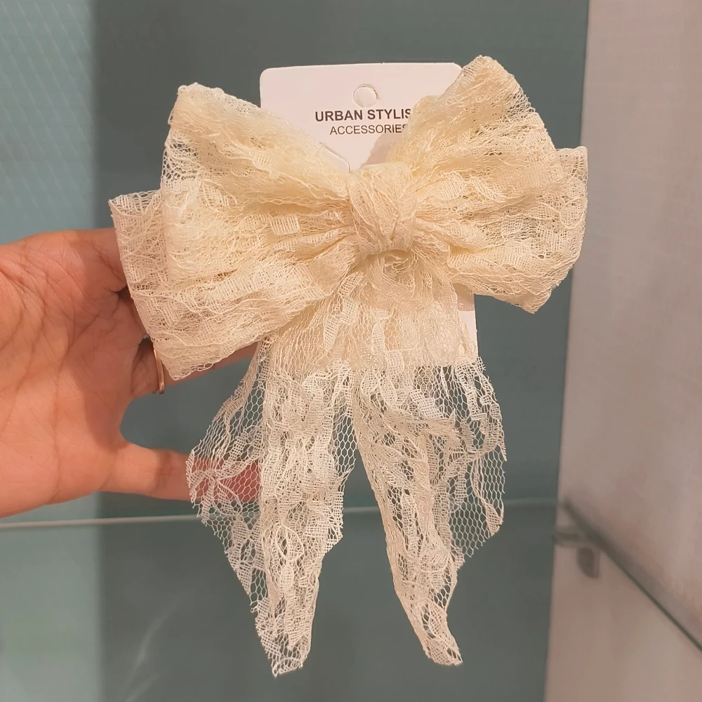 NAURA CREAM BOW