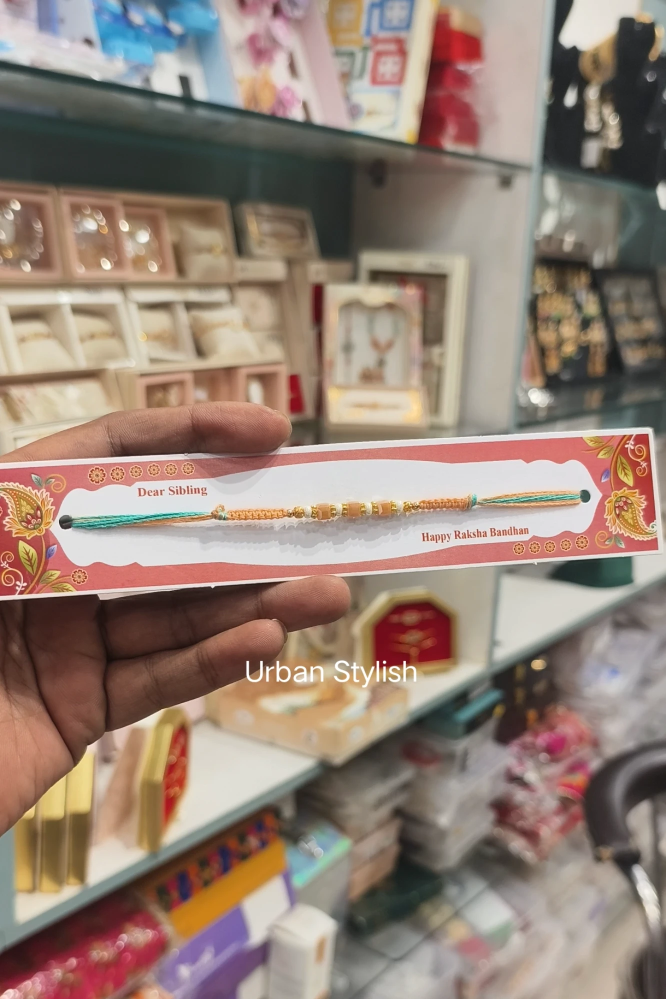 WHITE PEARLS THREAD RAKHI (A36)