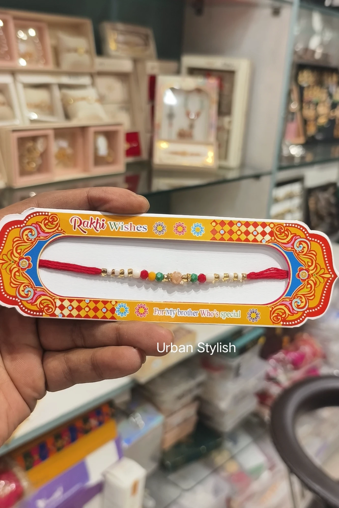 RED PEARL THREAD RAKHI (A37)