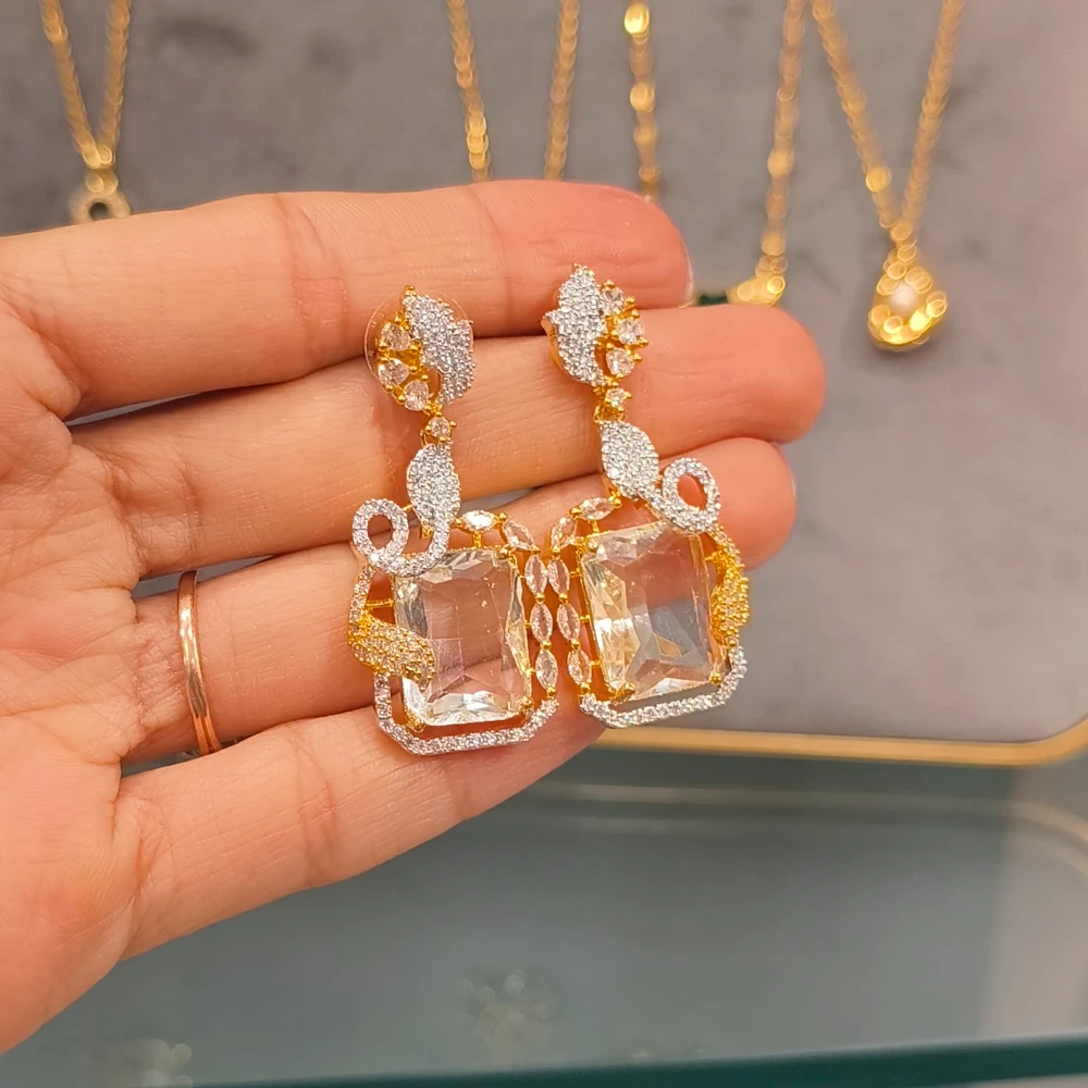 REHMAT GOLDEN AD EARRINGS