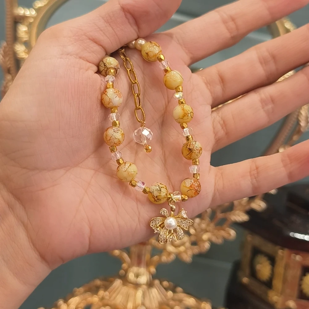 MEHROON GOLDEN RAKHI A38