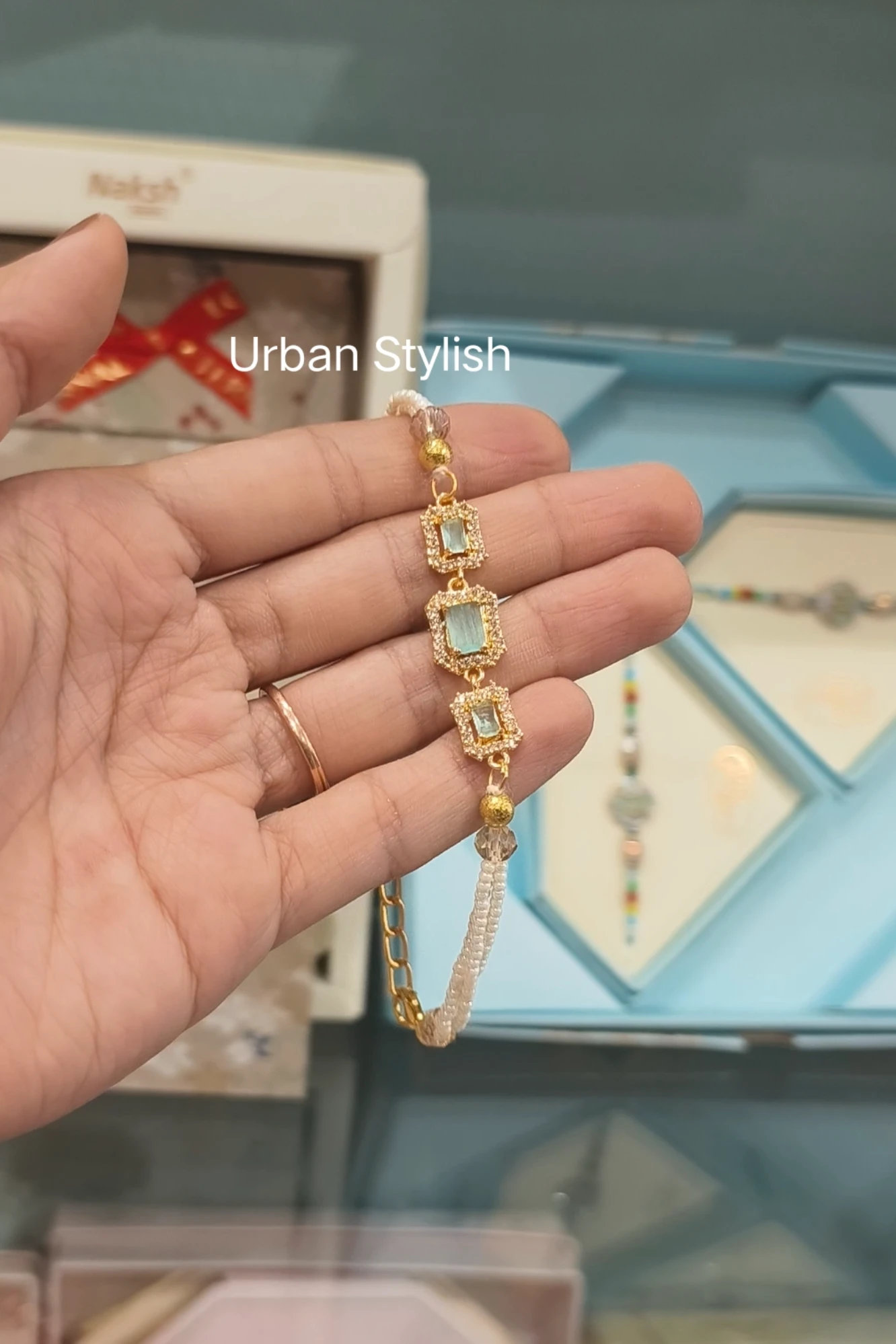 SOFIA GOLDEN SILVER C GREEN RAKHI (7422)