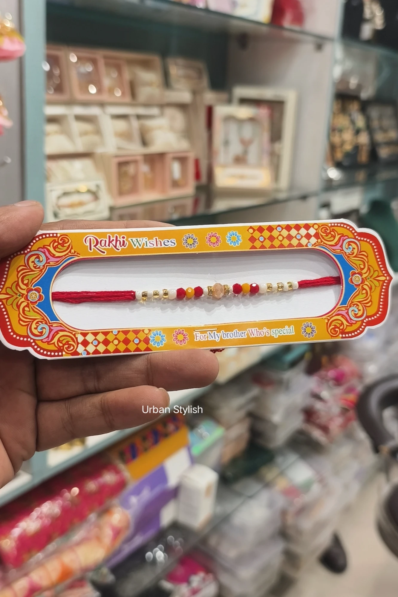 RED PEARL THREAD RAKHI (A37)
