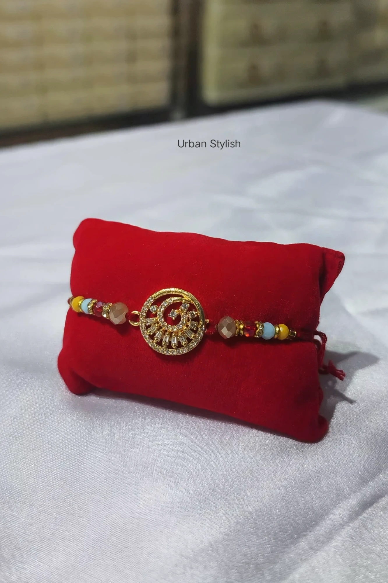 PEECOCK MOTI RAKHI (A21)