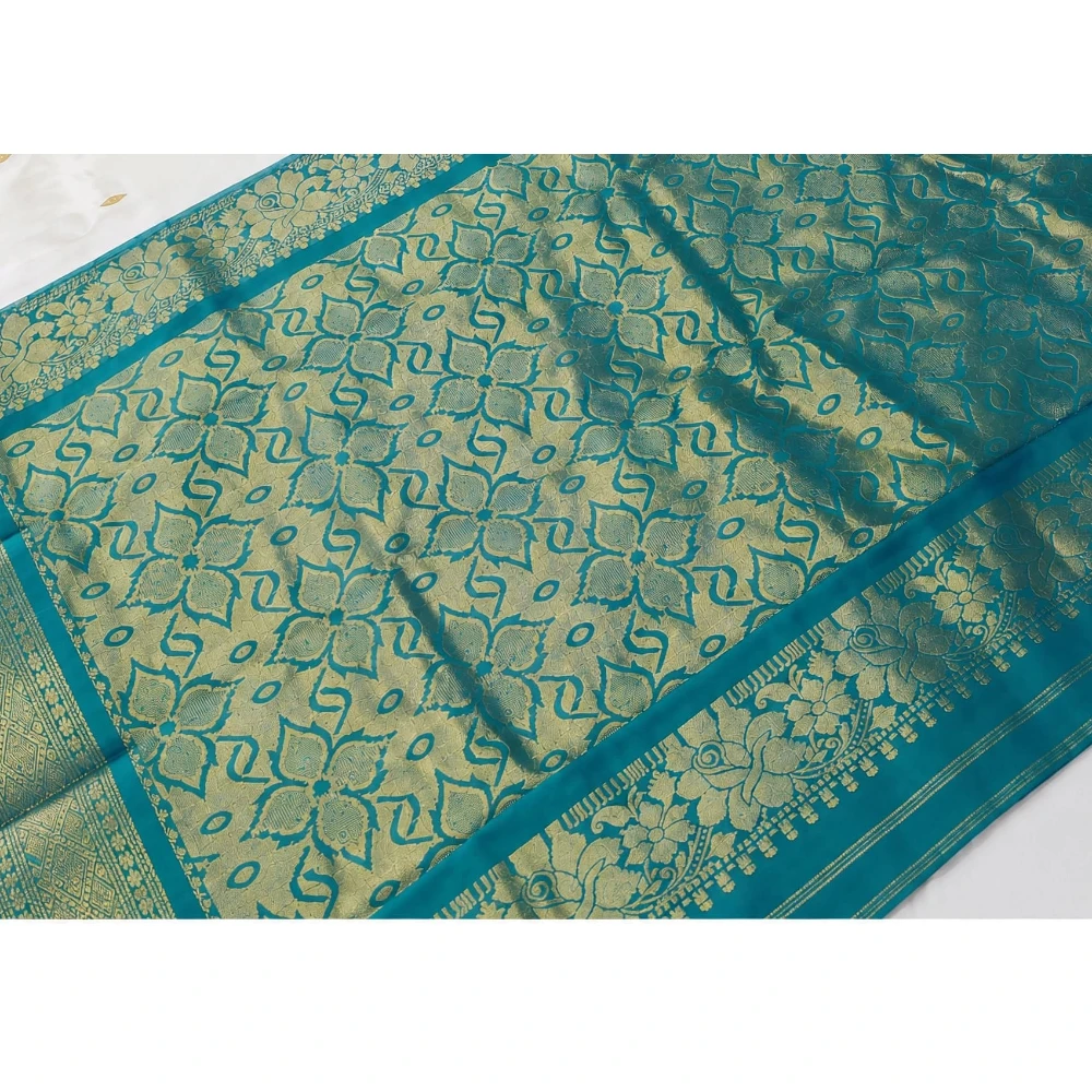 Green traditional silk saree with zari border for festive and wedding occasions
