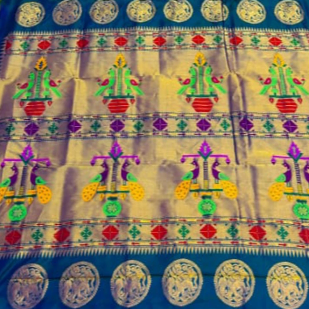 Exclusive Rani Pink Paithani self color pure silk saree with gold zari border, traditional Meena butta weaving and handwoven craftsmanship.