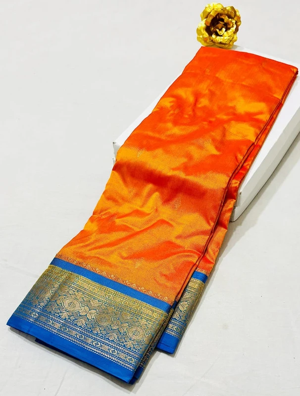 Deep Orange Kanchipuram pure silk saree with Green and Gold zari border, traditional Indian wedding saree
