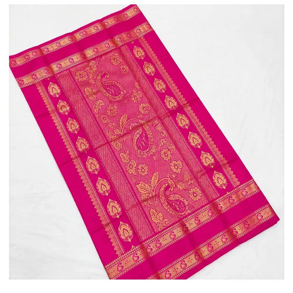 Off-white Kanchipuram silk saree with pink and gold Bentex border paisleys.
