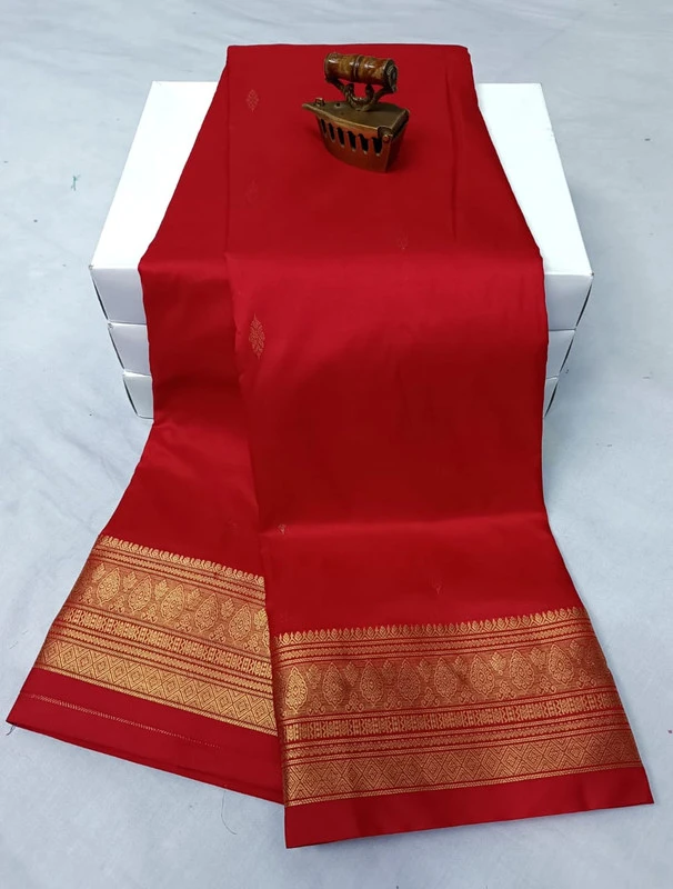 Peach Pink traditional silk saree with zari border for festive and wedding wear