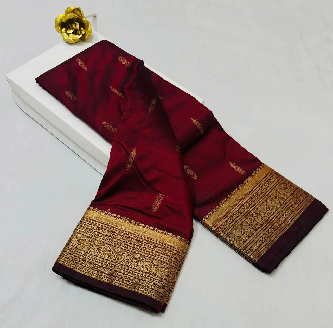 Marron traditional silk saree with zari border for wedding and festive wear