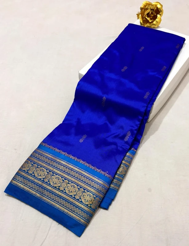 Kanchipuram silk saree turquoise blue border gold zari weaving designer sari