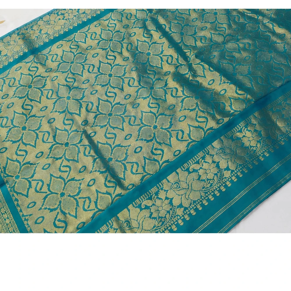 Blue traditional silk saree with zari border for festive and wedding occasions