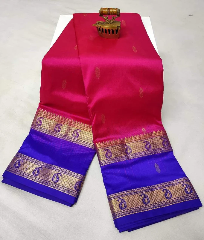 Rani pink silk saree with royal blue and gold Bentex paisley border.