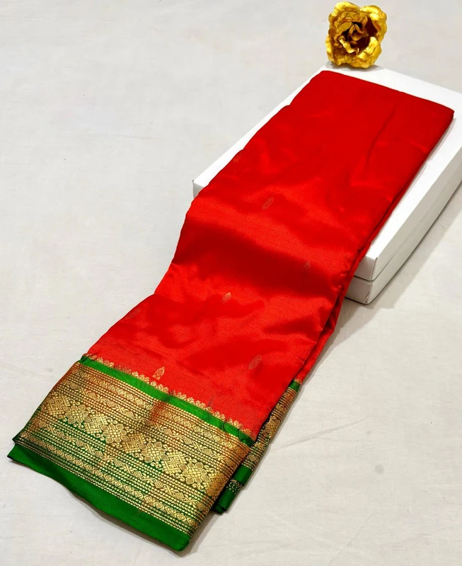 Red Kanchipuram pure silk saree with black and gold zari border