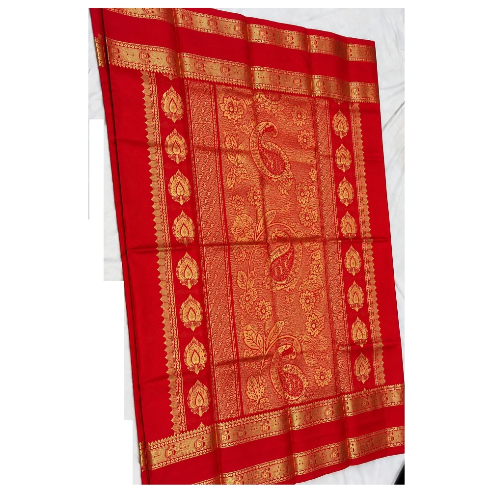 Forest green silk saree with red and Bentex gold border and paisley motifs.