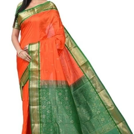 Dark Orange and Green Contrast Traditional Sarees for Arangetram in Kanjeevaram Silk