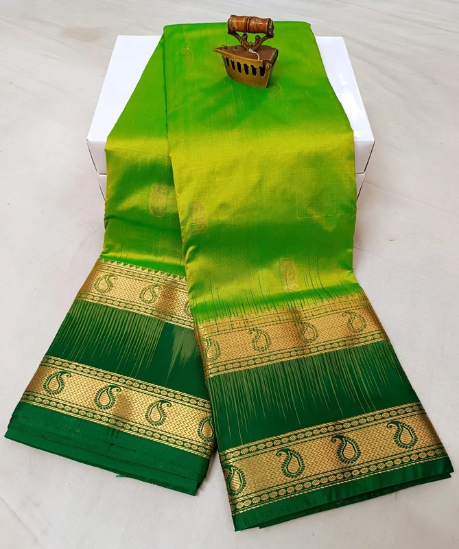 Green and Dark Green Kanchipuram silk saree with Bentex border and golden motifs