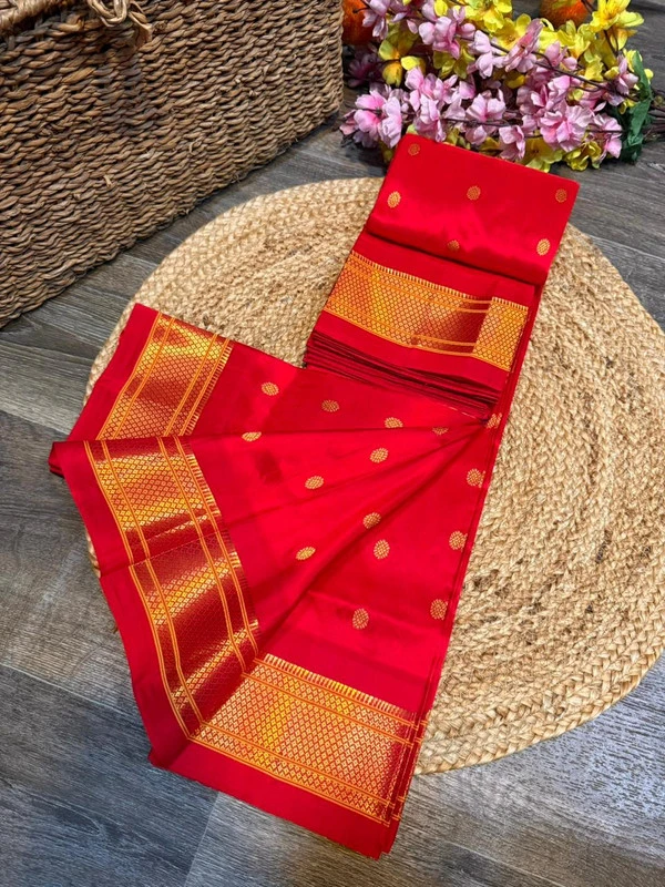 Exclusive Red Paithani self color pure silk saree with gold zari border, traditional Meena butta weaving and handwoven craftsmanship.