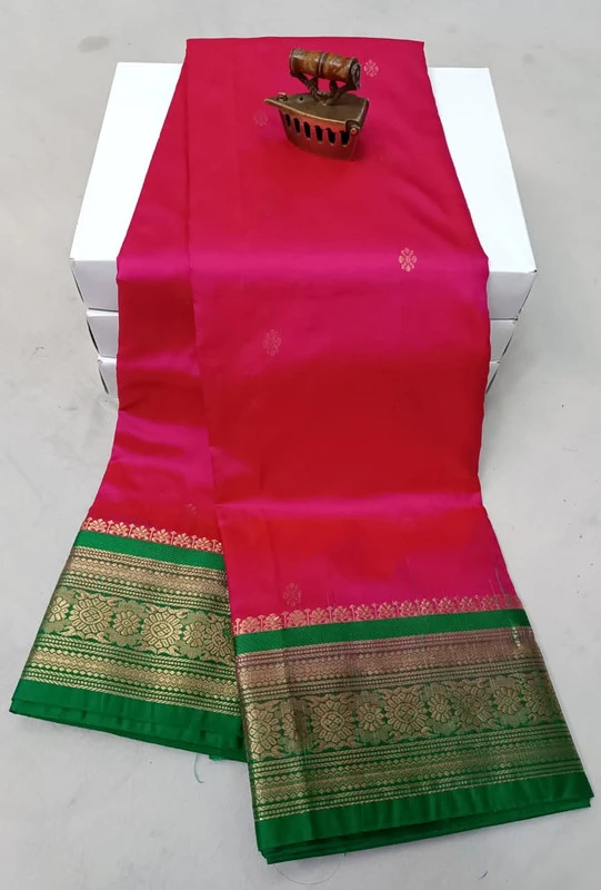 Rani Pink with Green traditional silk saree with zari border for festive and wedding occasions
