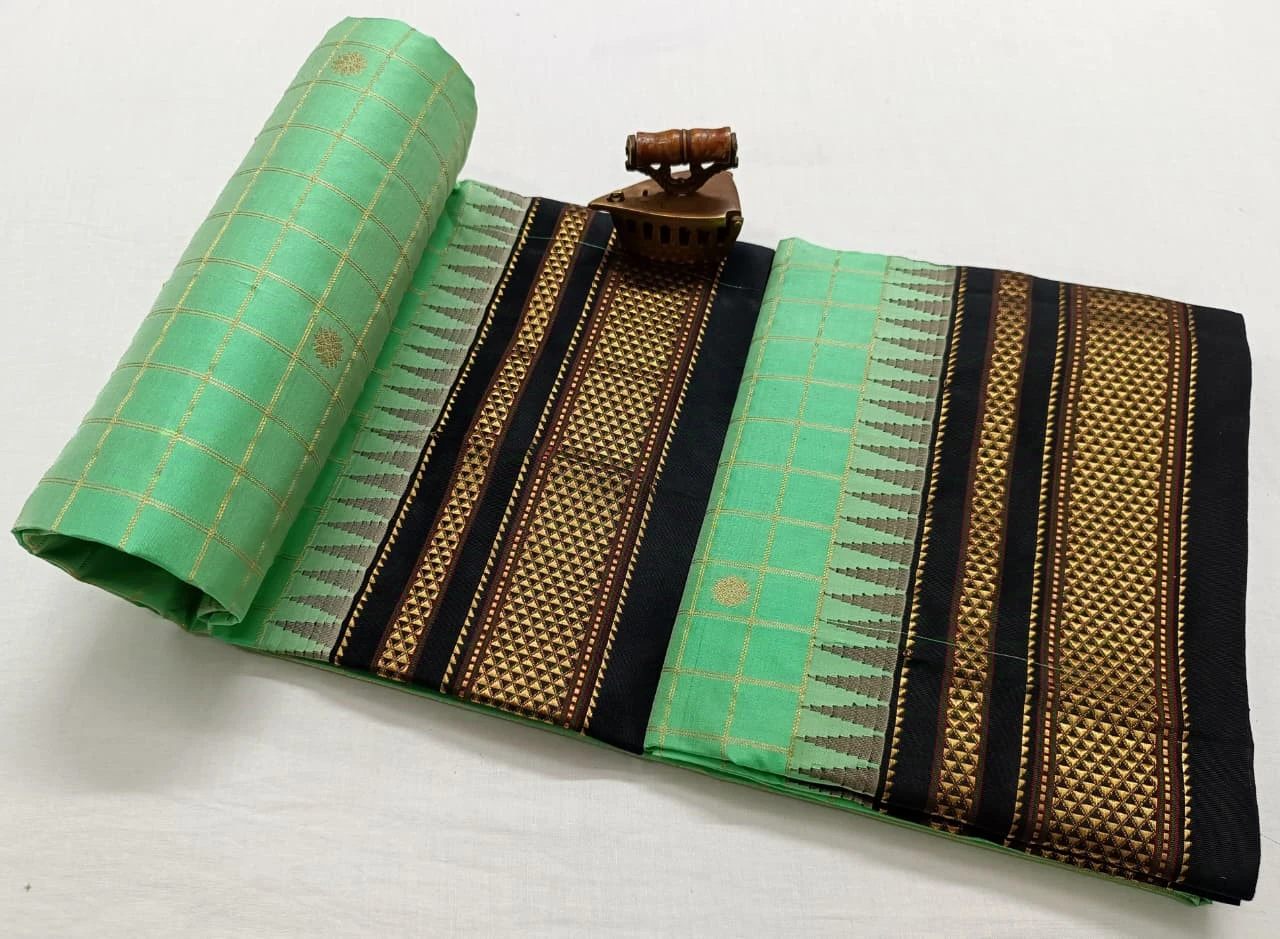 Pure Ilkaal Checks saree in Leaf Green and Black with zari border and traditional woven patterns