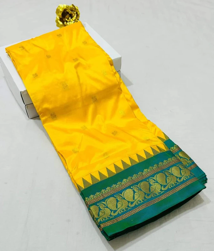 Yellow Gadwal Paithani Silk Pure Silk Saree with Rich Contrast Green Border