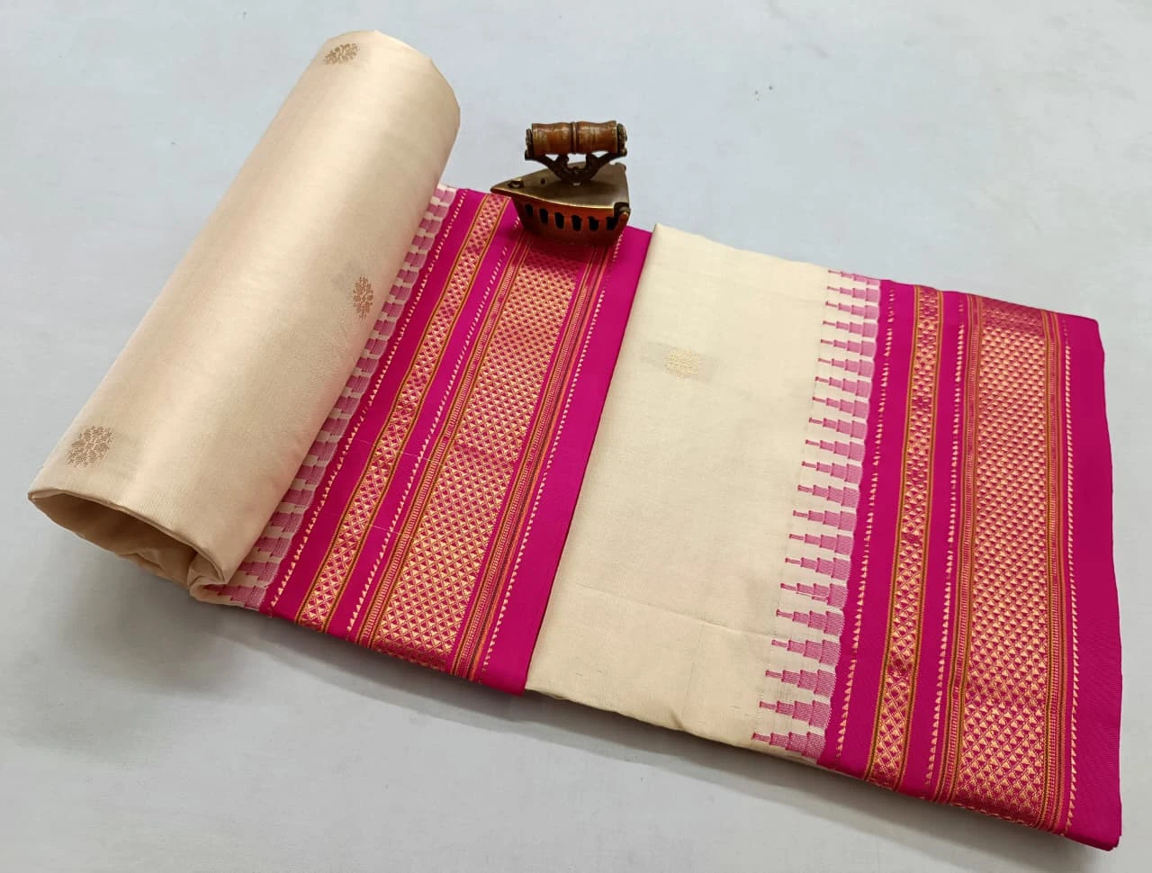 Cream Ilkaal Butta pure silk saree with zari border and traditional woven patterns